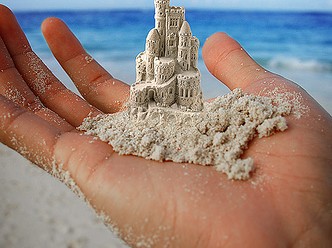 Sand Castle in Hand